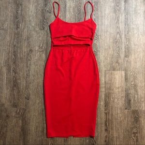 Mid length dress with sexy waist cut out